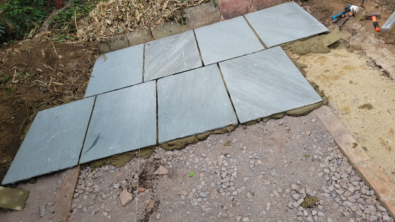 Natural stone paving being laid